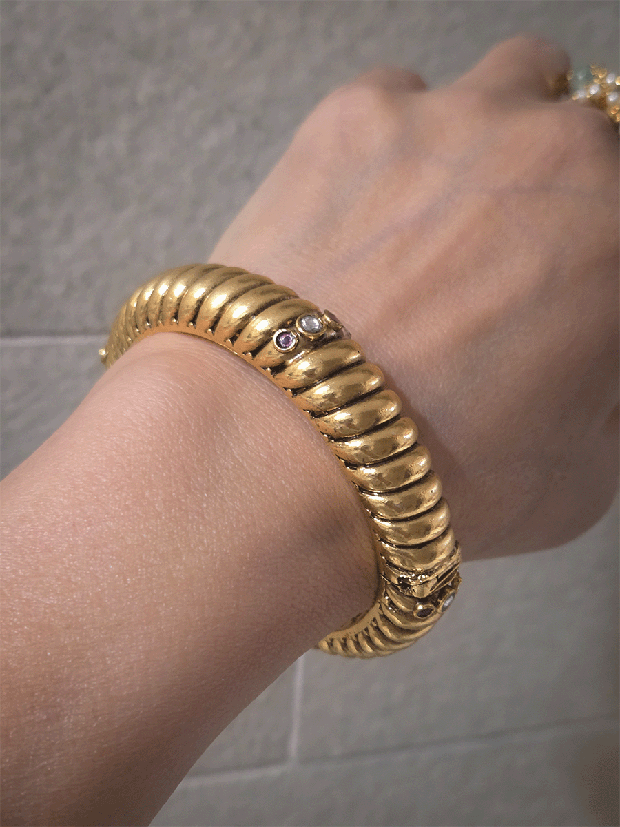 Single openable gold plated traditional design kada with kundan and ruby stones