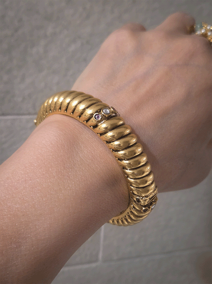 Single openable gold plated traditional design kada with kundan and ruby stones
