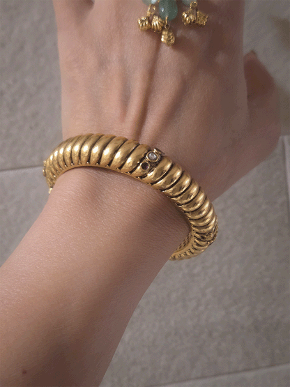 Single openable gold plated traditional design kada with kundan and ruby stones