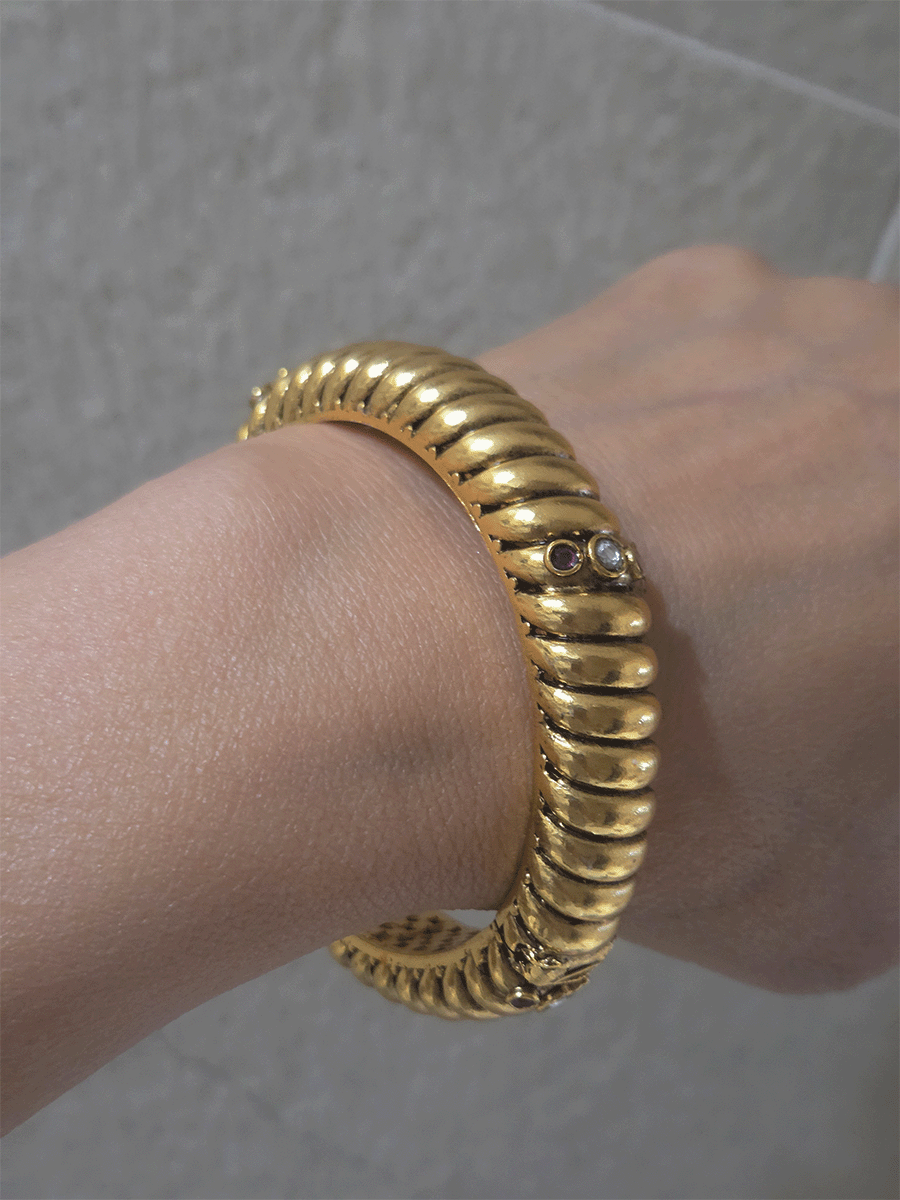 Single openable gold plated traditional design kada with kundan and ruby stones