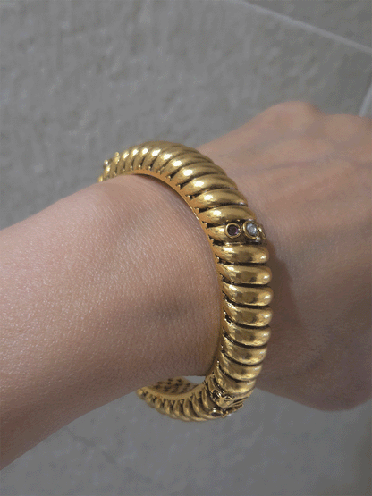 Single openable gold plated traditional design kada with kundan and ruby stones