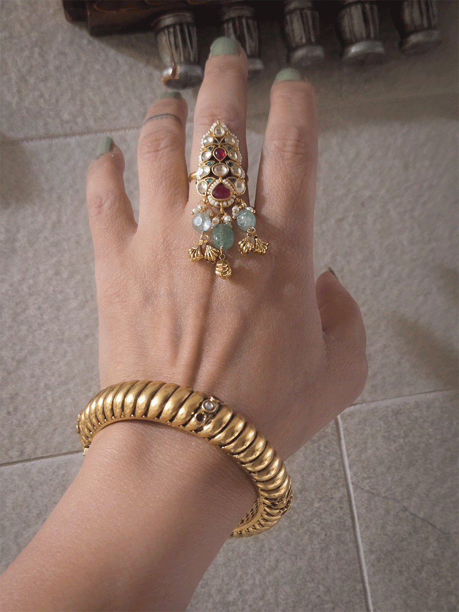 Single openable gold plated traditional design kada with kundan and ruby stones
