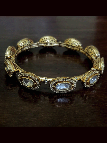 Set of two oval kundan with zircon studded kada's