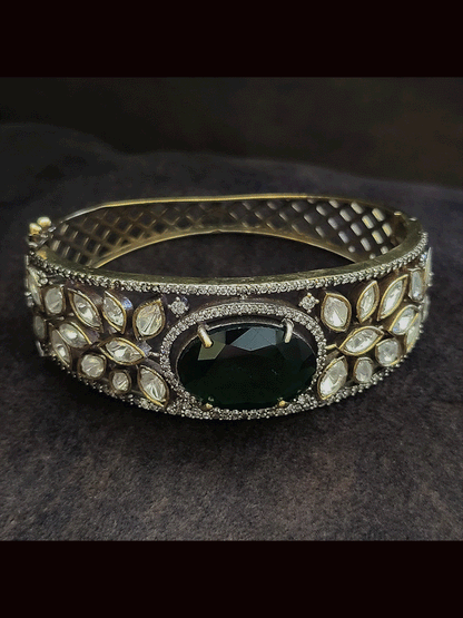 Single antique gold and black finish stone and kundan openable kada