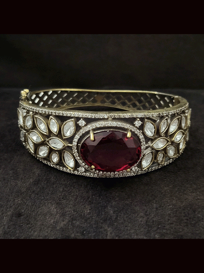 Single antique gold and black finish stone and kundan openable kada