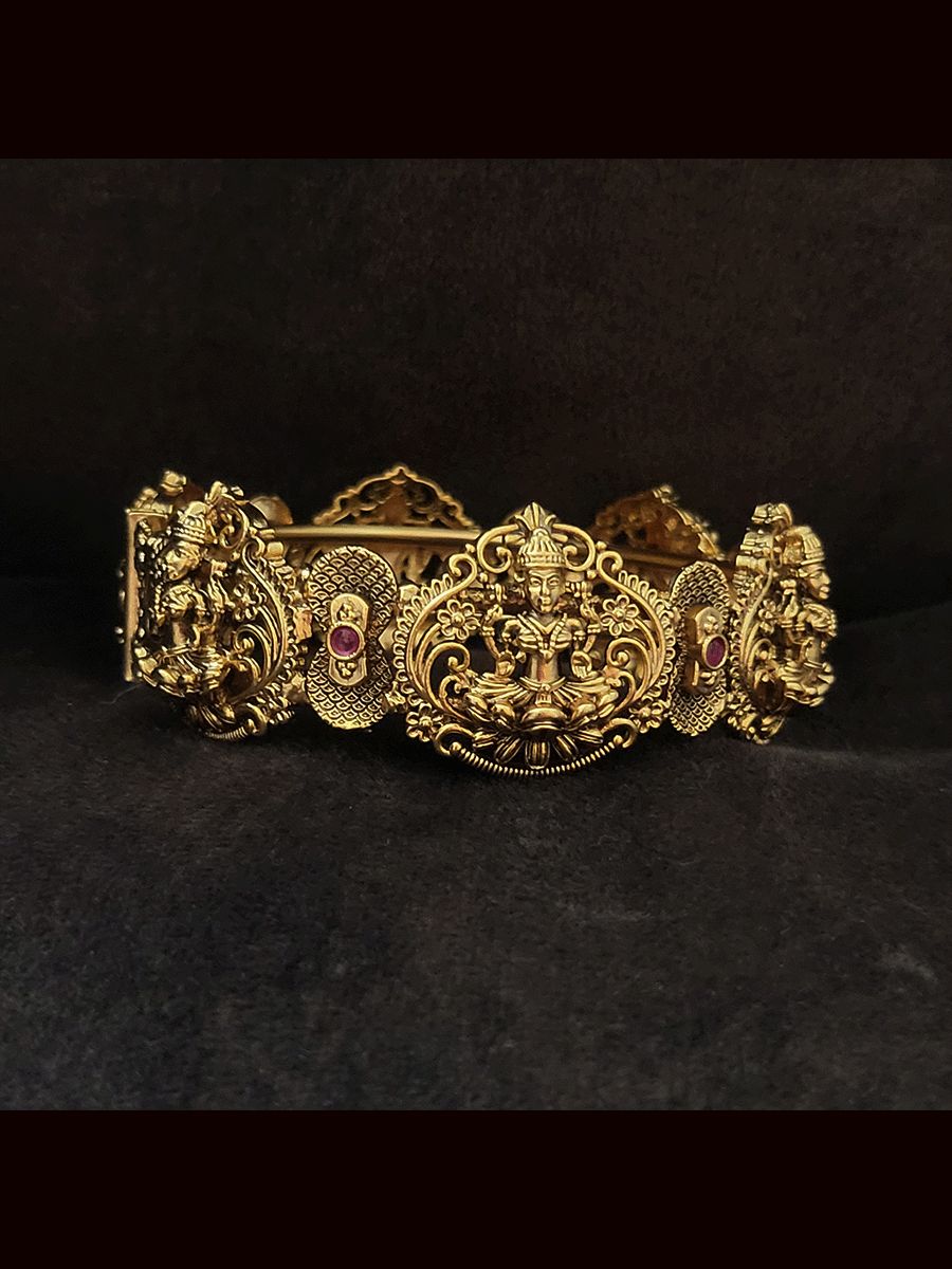 Set of two openable laxmiji motif kada's with ruby stones in between