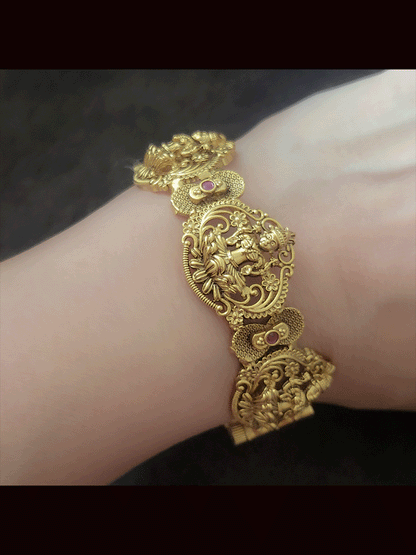 Set of two openable laxmiji motif kada's with ruby stones in between