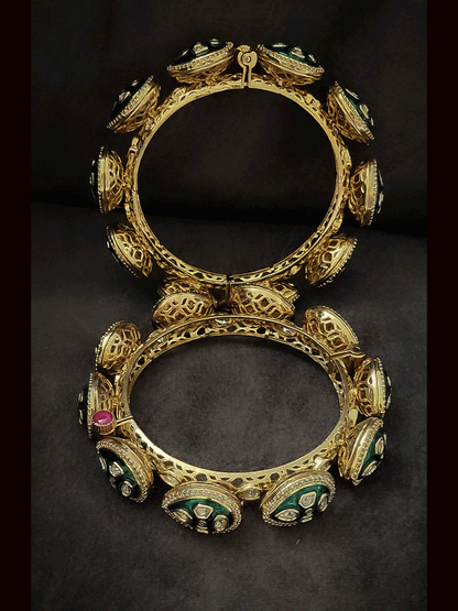 Set of two openable leaf shaped top with green enamel uncut polki pacheli's