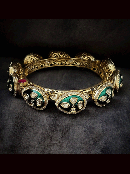 Set of two openable leaf shaped top with green enamel uncut polki pacheli's