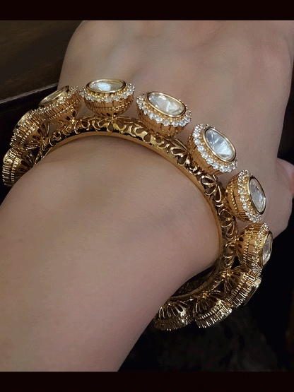 Set of two oval kundan  pacheli's with zircon detailing