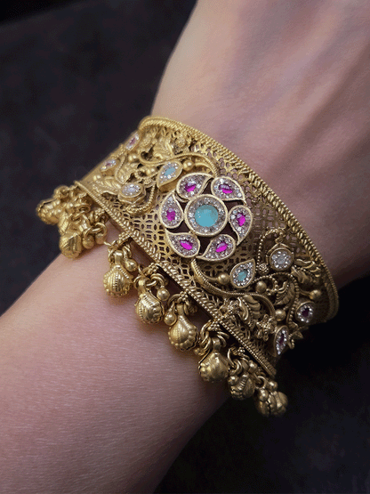 Aqua and ruby stones with zircon outline flower broad single openable kada with ghunghru hanging's