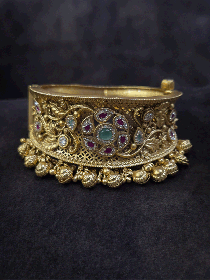 Aqua and ruby stones with zircon outline flower broad single openable kada with ghunghru hanging's