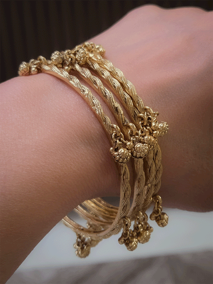 Set of four rope design bangles with ghunghru hangings