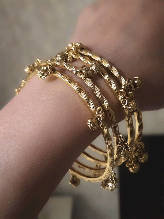 Set of four rope design bangles with ghunghru hangings