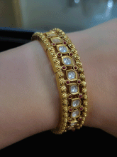 Load image into Gallery viewer, Single leaf shaped uncut polki with both sides ruby stones adjustable kada