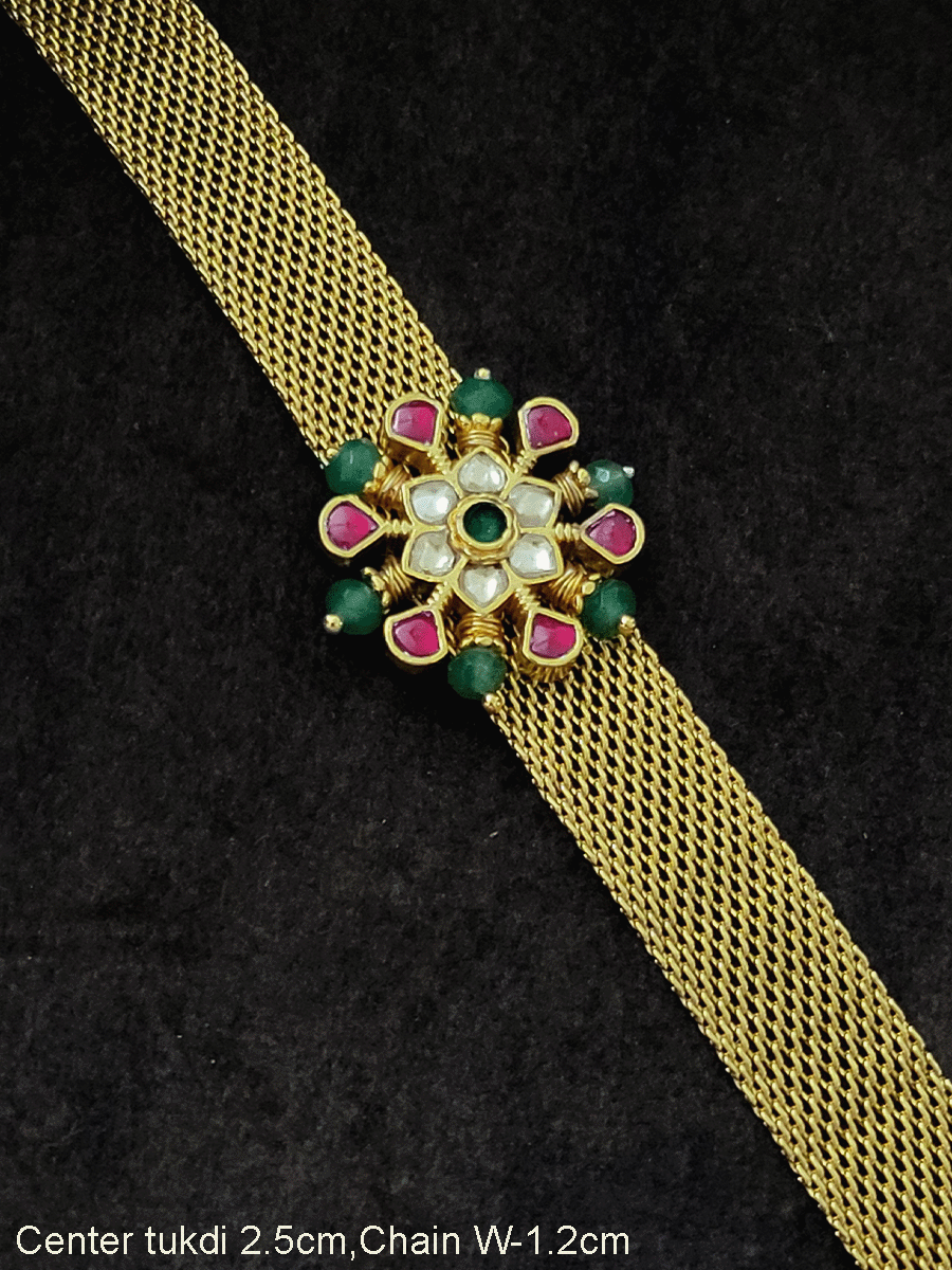 Paachi kundan flower with ruby and green bead detailing adjustable bracelet