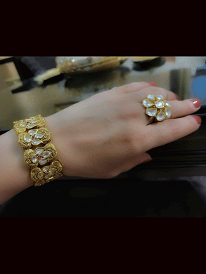 Uncut polki flower with ruby stone center adjustable kada(2.5cm broad)