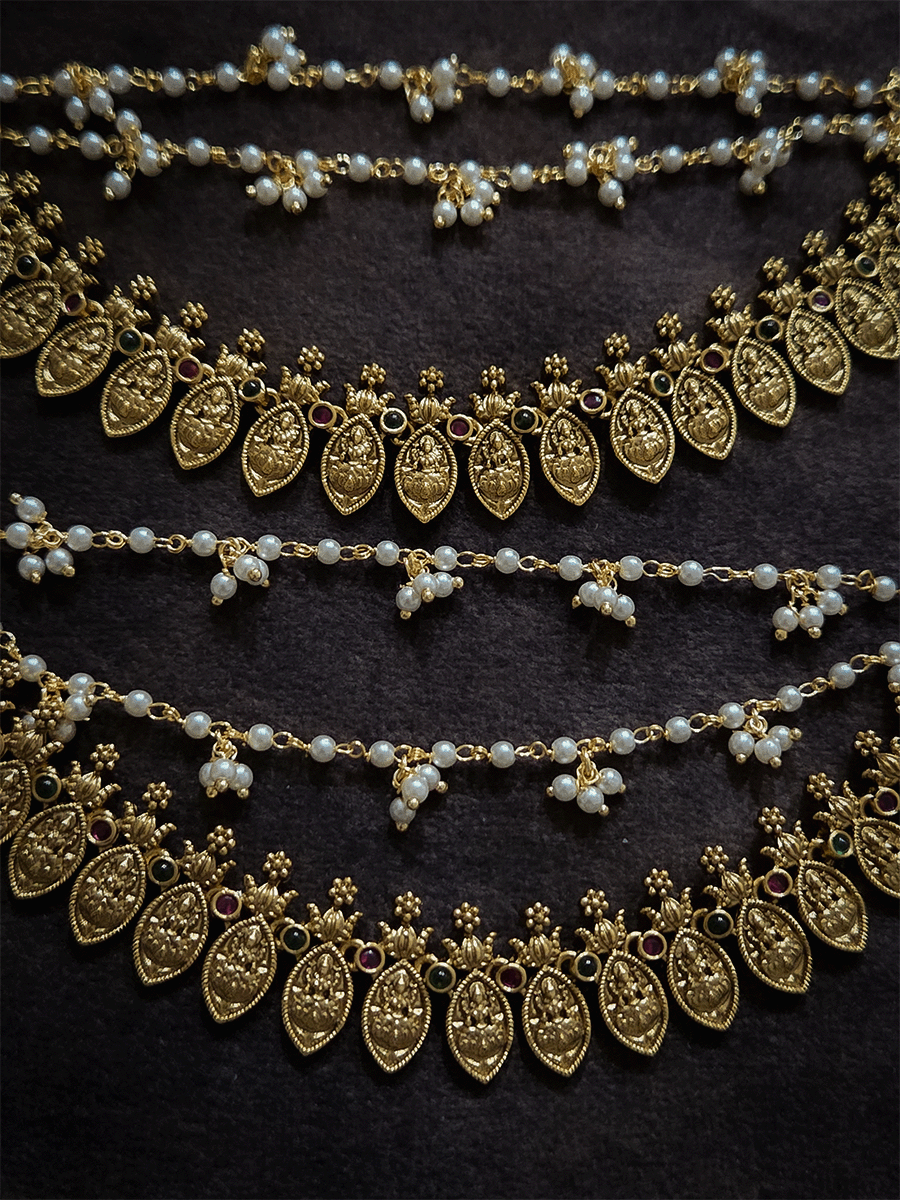 Laxmiji motif's in leaf string triple layer ear chains with two pearl bead strings