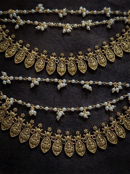 Laxmiji motif's in leaf string triple layer ear chains with two pearl bead strings