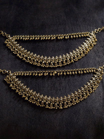 Double layer kundan studded with intricate leaf and flower design ear chains