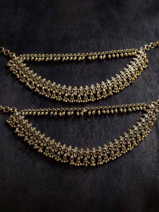 Double layer kundan studded with intricate leaf and flower design ear chains