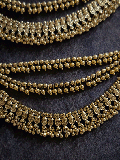 Three layers with bead hangings and circular self design ear chains