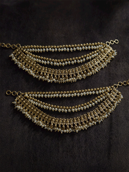 Three layers with bead hangings and circular self design ear chains