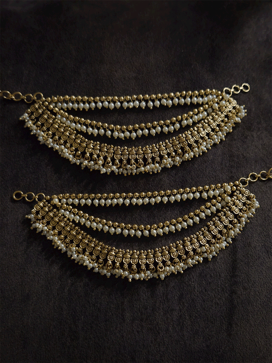 Three layers with bead hangings and circular self design ear chains