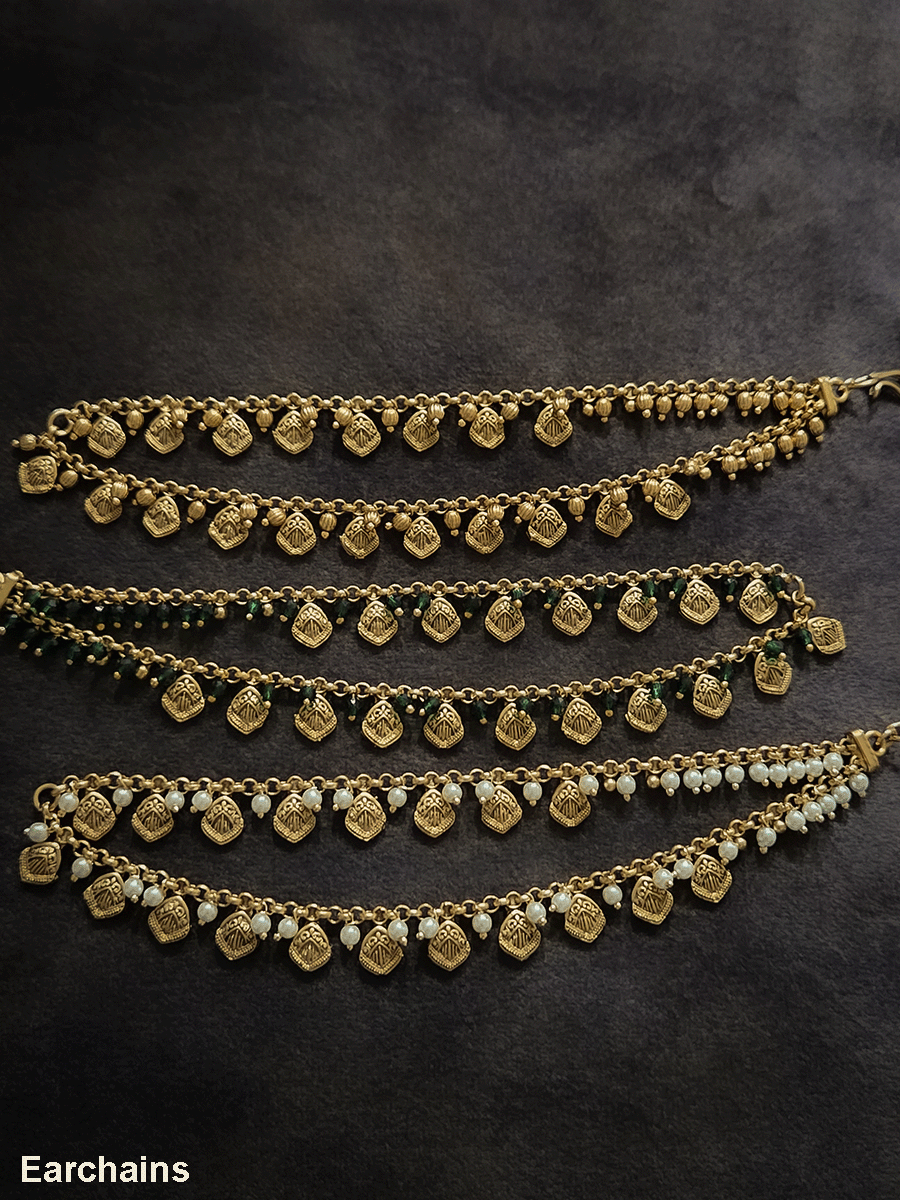 Two layer traditional self design tukdies with pearl hangings ear chains