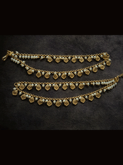 Two layer traditional self design tukdies with pearl hangings ear chains