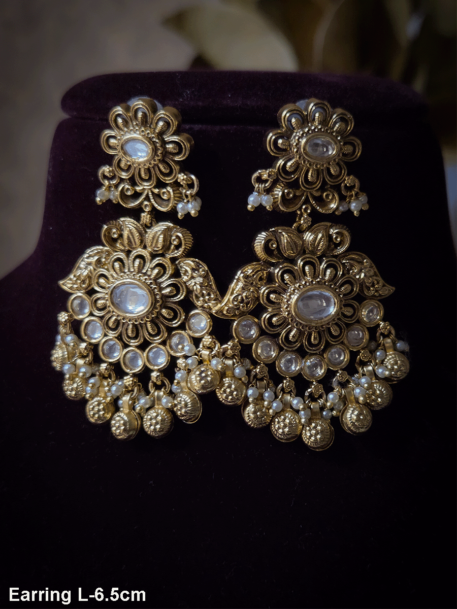 Flower with side leaf design and flower top kundan earrings with flower desing ghunghru hanging's