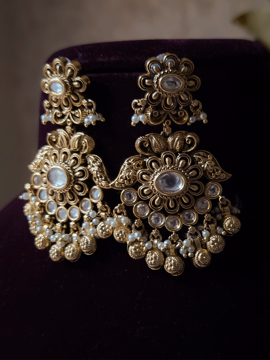 Flower with side leaf design and flower top kundan earrings with flower desing ghunghru hanging's