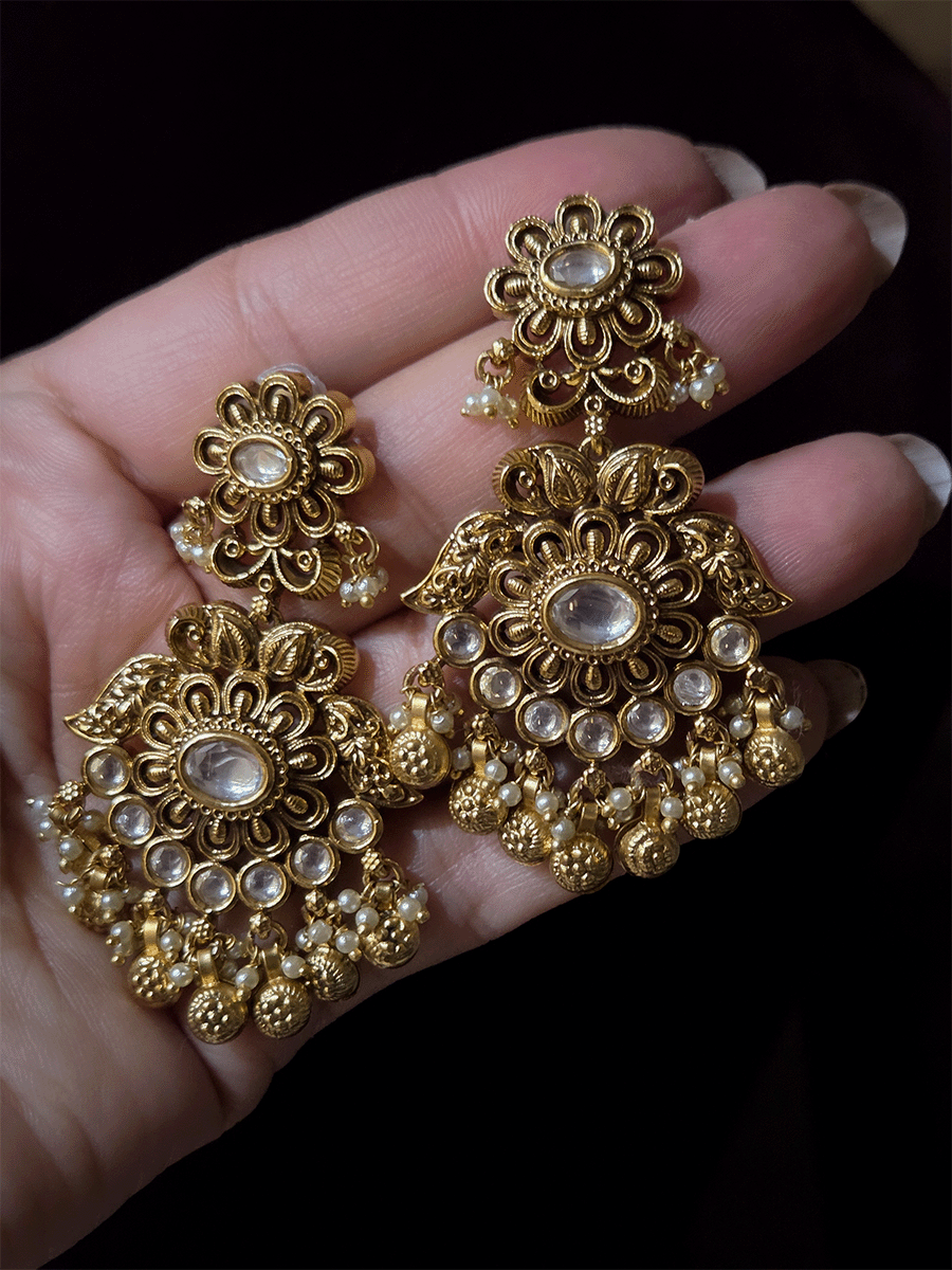 Flower with side leaf design and flower top kundan earrings with flower desing ghunghru hanging's