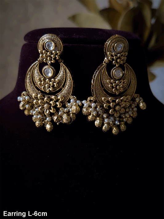 Circular kundan top with flower at bottom ghunghru hanging earrings