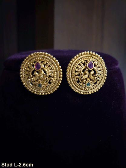 Circular flower with green stone at bottom of peacock design studs with tear shaped ruby stone