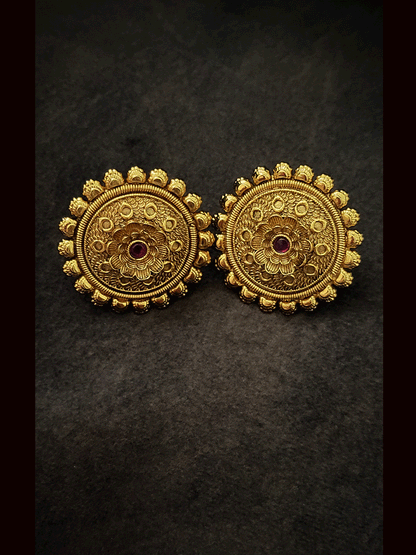 Flower center ruby stone round stud