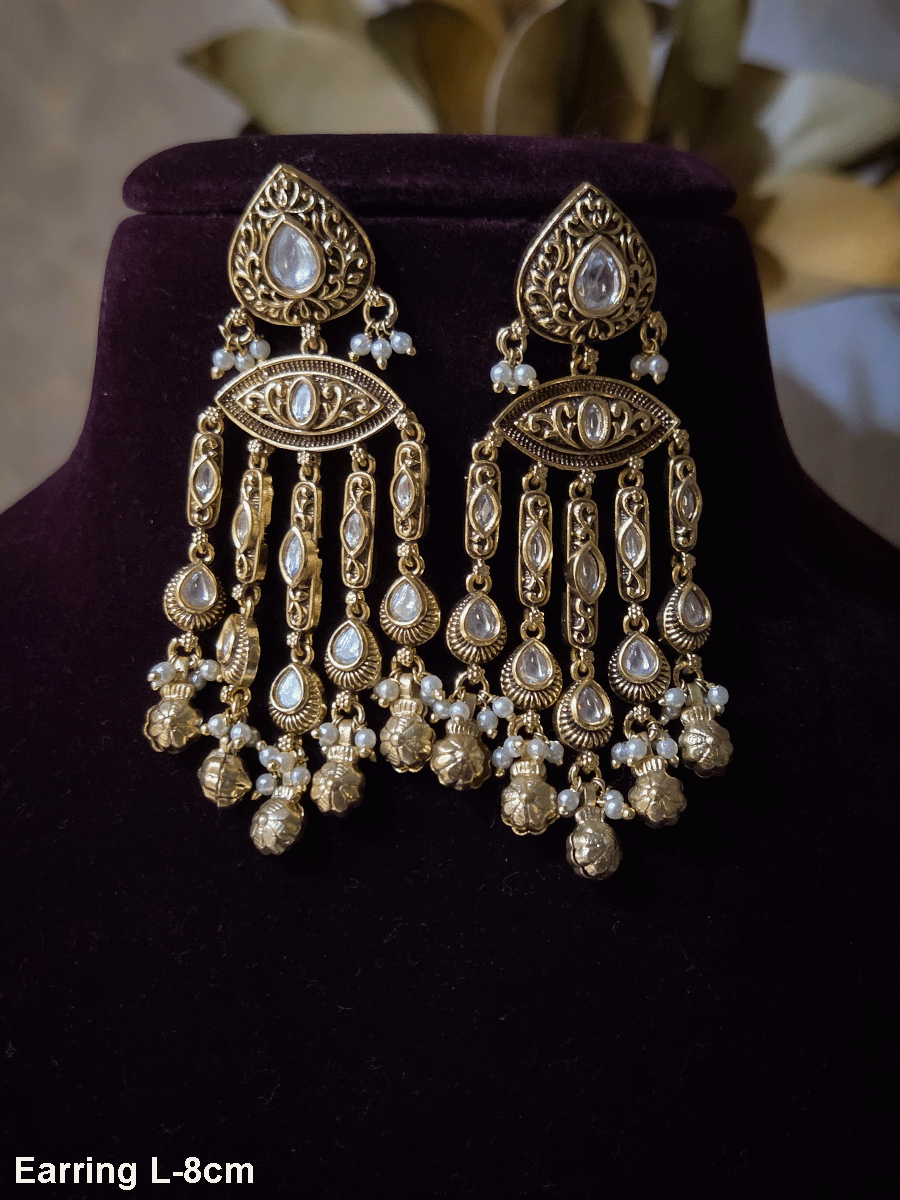 Leaf top with kundan earrings with antique kundan tukdies long tassels