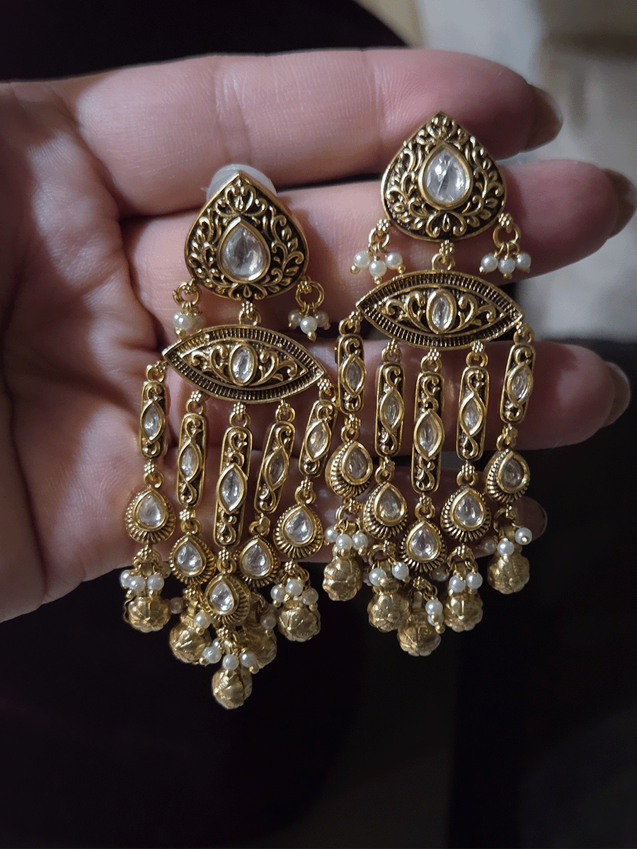 Leaf top with kundan earrings with antique kundan tukdies long tassels