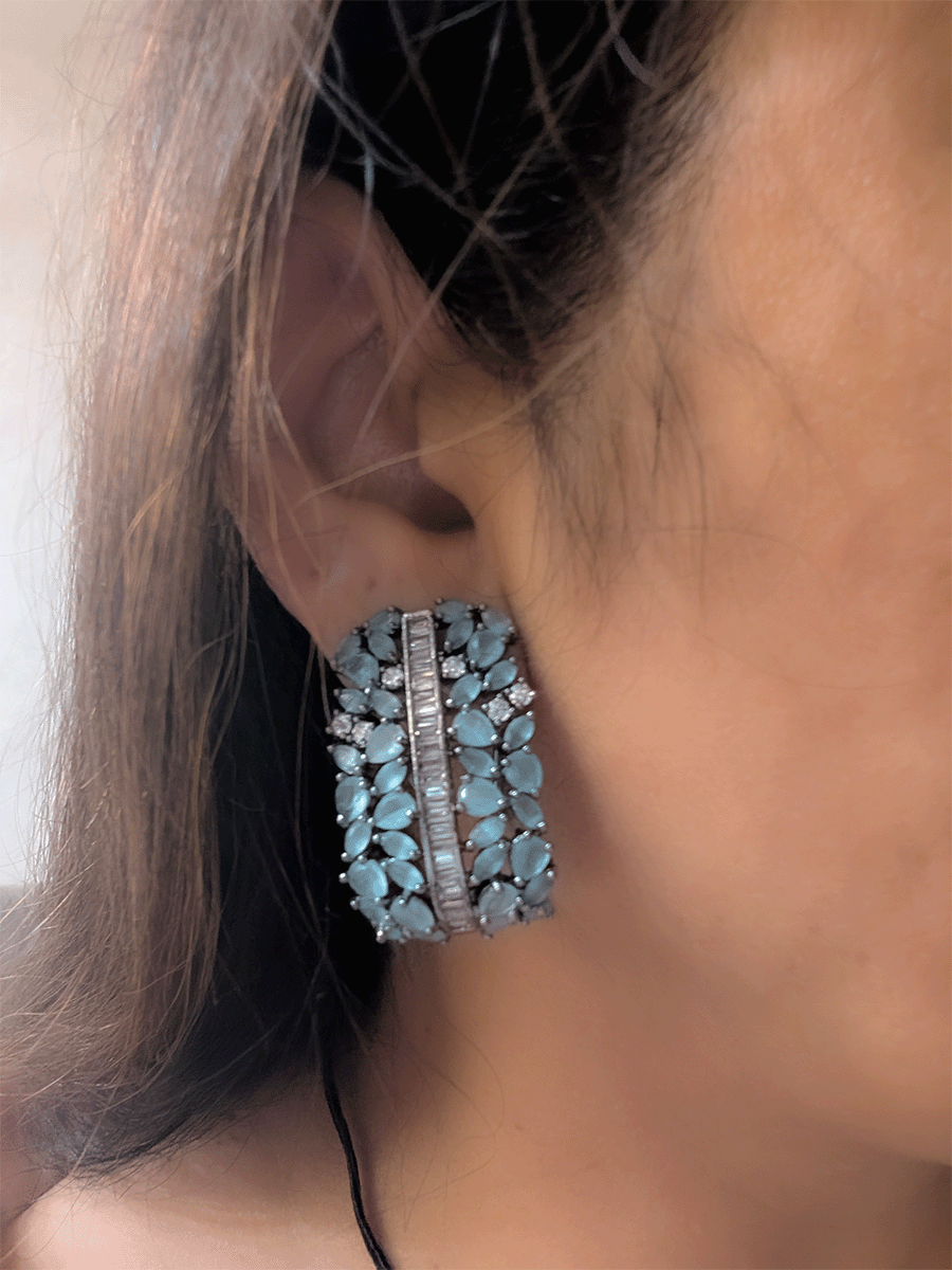 Pear shaped coloured stones and AD studded black finish earrings