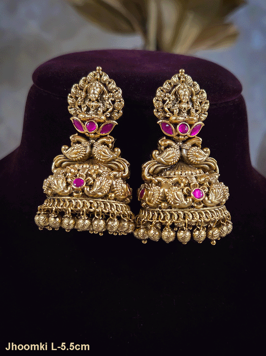 Laxmiji on flower top with peacock in center and peacock domb design jhoomki