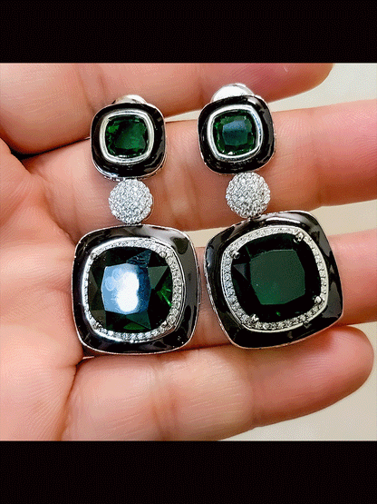 Silver finish black enamel square stone earrings with zircon studded center peice