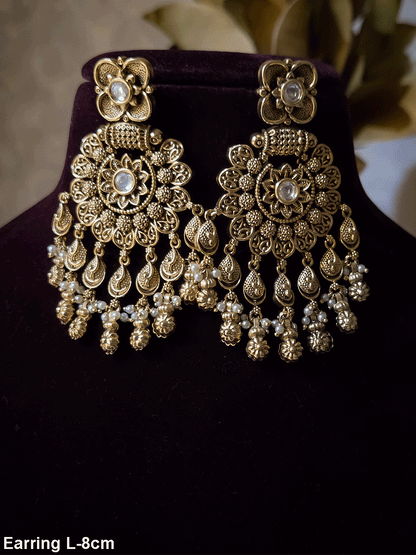 Flower design earrings with flower top and leaf tassels