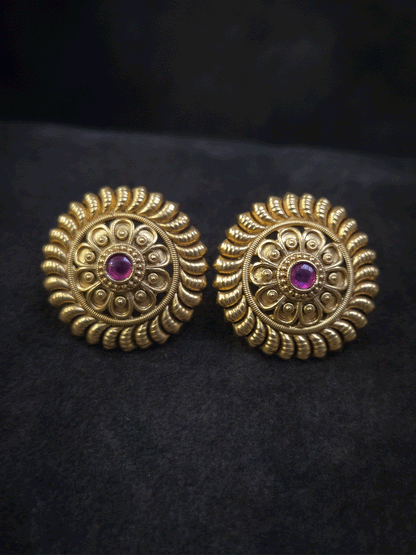 Round ruby stone flower center 3cm broad studs with leaf design on circumference