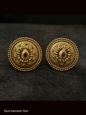Round 3cm diametrer bold studs with tear drop shaped ruby stone on flower design
