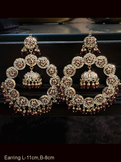 Bold 11cm long jadau chandbali earrings with jhoomki hanging in the center