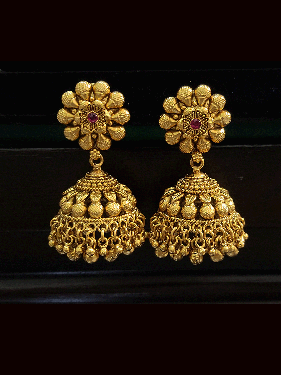 Flower top ruby stone jhoomki with leaf design in domb