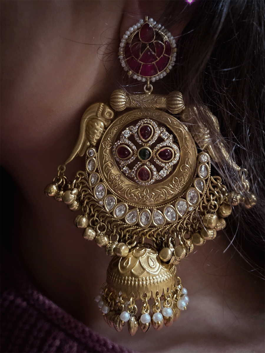 Stone studded leaf top 11cm long jhoomki earrings with peacock side design and polki's