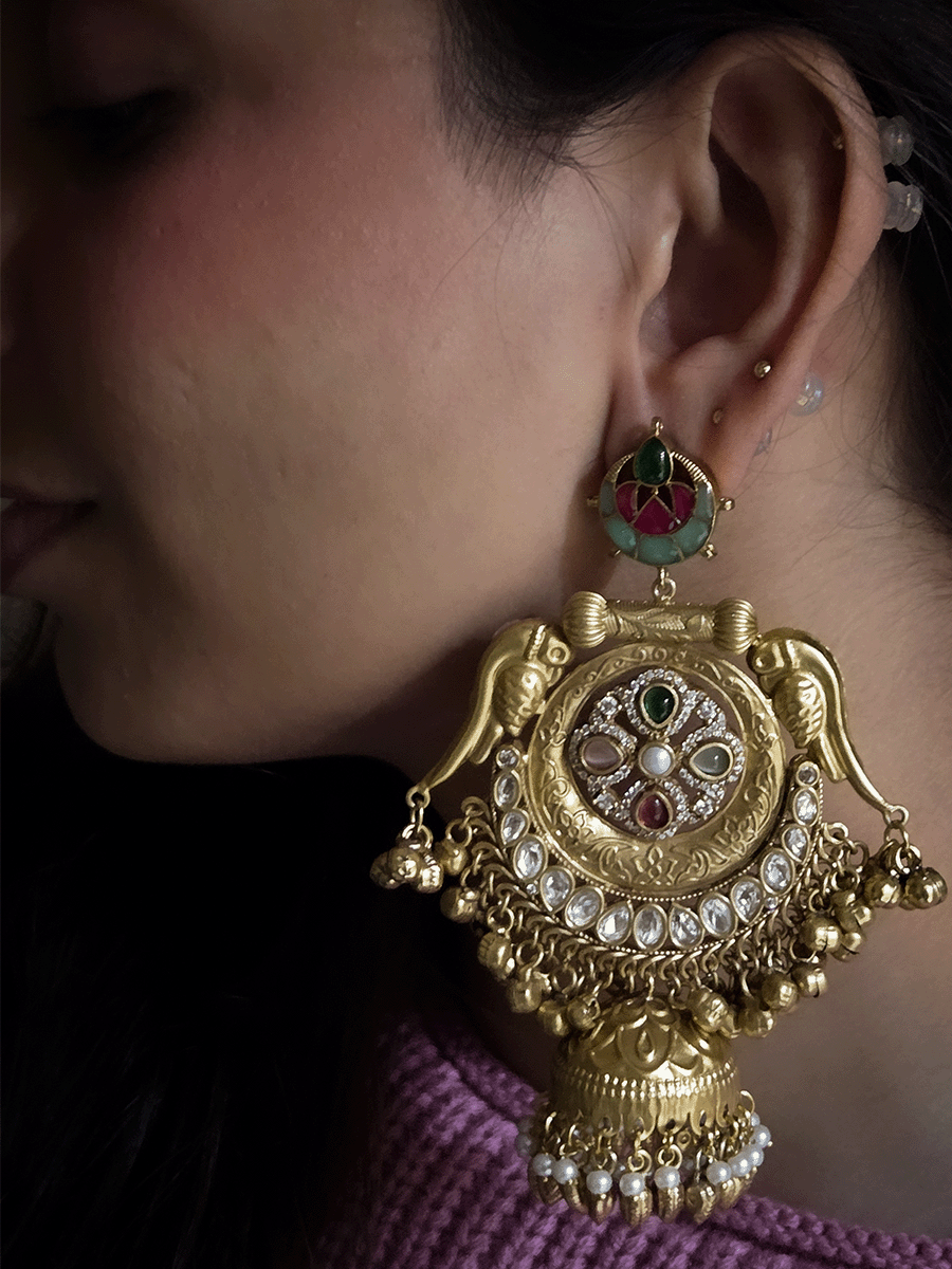 Stone studded leaf top 11cm long jhoomki earrings with peacock side design and polki's