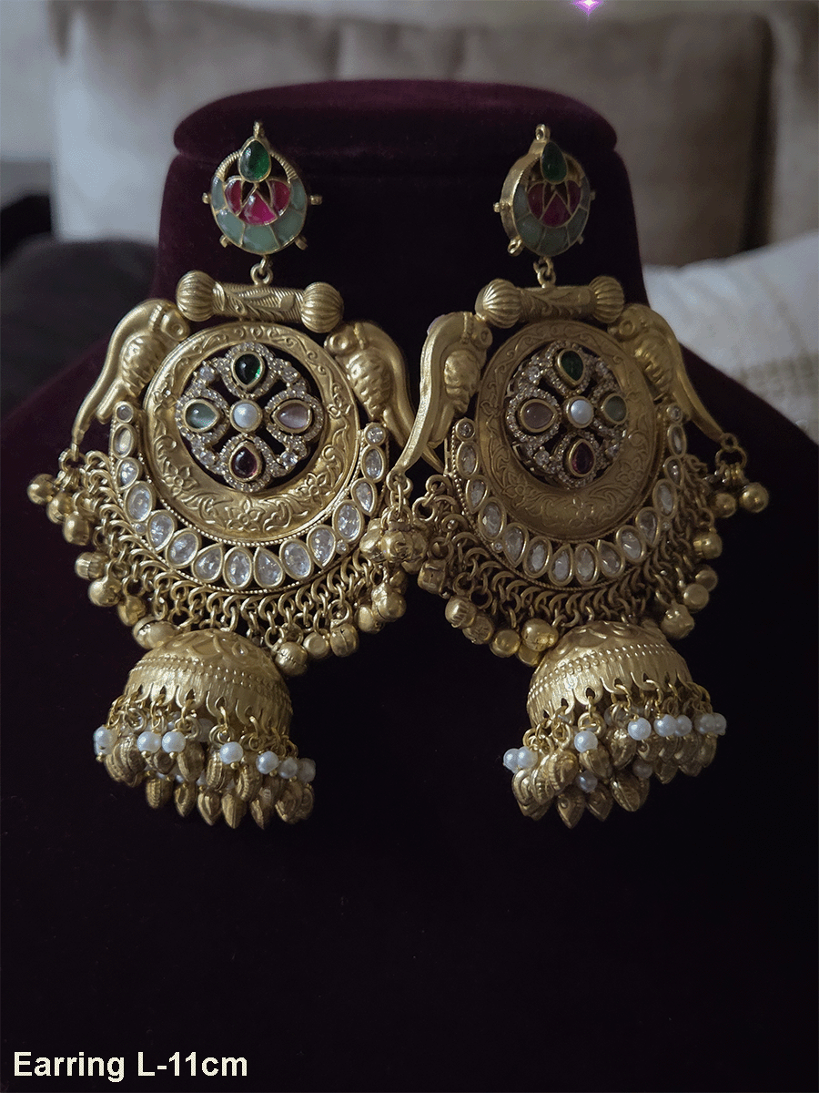 Stone studded leaf top 11cm long jhoomki earrings with peacock side design and polki's