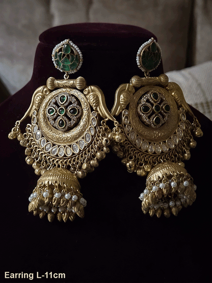 Stone studded leaf top 11cm long jhoomki earrings with peacock side design and polki's
